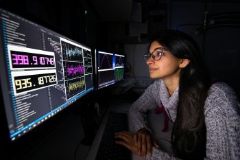Dr Mariam Akhtar at the control panel of a quantum computer at the Ƶ
