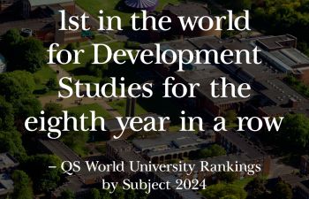 Graphic showing the Ƶ campus with white text on top reading '1st in the world for Development Studies for the eighth year in a row' - QS World University Rankings by Subject 2024 White logos for IDS and Sussex.